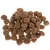 Ruskeita, pyöreitä kuivaruokanappuloita valkoisella taustalla. Tuotemerkki ja tarkempi tuotenimi eivät näy kuvassa.