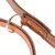 Close-up of a brown leather collar with gold-coloured metal ring and sturdy rivets. High-quality workmanship visible.
