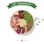 Bowl with raw chicken pieces, red meat, green peas, brown lentils, and diced yellow cubes. Banner above reads 'Key Ingredients'. Some peas scattered beside the bowl.