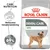 Royal Canin Dental Care Mini hundfoderpåse, text: Reducerar tandstensbildning, bevisade resultat upp till 69 % reducerad tandstensbildning, bild på liten hund. Royal Canin Dental Care Mini hundfoderpåse, text: Reducerar tandstensbildning, bevisade resultat upp till 69 % reducerad tandstensbildning, bild på liten hund.