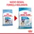 Royal Canin Junior Giant, nuovo design e formula migliorata. Confezioni a confronto: vecchia con scritta '45 kg', nuova con '8–18/24 months/mois' e 'adult weight over 45 kg'.