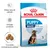 Confezione Royal Canin Puppy Maxi 2–15 months, con scritte: Difese naturali ottimali, Sviluppo cerebrale, Crocchette di dimensione adattata, immagine di crocchette e cucciolo.