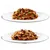 Two white plates with chunks of brown wet pet food, top plate includes visible green vegetable pieces, bottom plate shows only brown food. No packaging or branding visible.