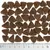 Triangular brown kibble pieces arranged in rows with a ruler below showing each piece is about 2 cm wide, illustrating the size and shape of the product.