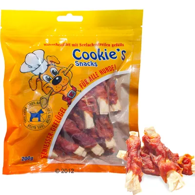 Cookie's Snacks -koiranherkut, 200 g pussi. Pakkauksessa tekstiä saksaksi: 'Für alle Hunde!', 'Geflügel', '100% Natur'. Näkyvissä kananlihaan käärittyjä purutikkuja.