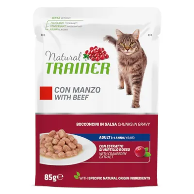 Natural Trainer, bouchées en sauce au bœuf pour chat adulte, extrait de canneberge, sans colorants, conservateurs ni arômes, 85 g. Texte en anglais et italien visible sur l’emballage.