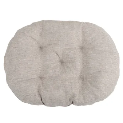 Cuscino ovale imbottito in tessuto beige, superficie trapuntata visibile senza marchi o testo.