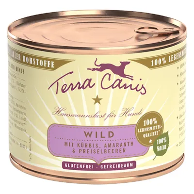 Boîte Terra Canis pour chien, texte visible : Wild mit Kürbis, Amaranth & Preiselbeeren, 100 % Lebensmittel-Qualität, 100 % Natur, glutenfrei, getreidearm. Texte en allemand.