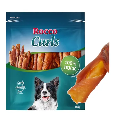 Rocco Curls, 100% pato, envase resellable, 200g. Imagen de un perro y una sola Curl.