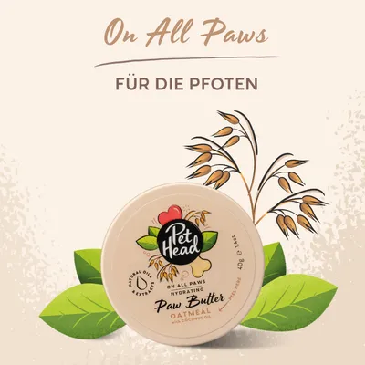 Pet Head Paw Butter Oatmeal s kokosovim uljem, hidratantni maslac za šape, 40 g. Tekst na slici: On All Paws, Für die Pfoten (na njemačkom jeziku).