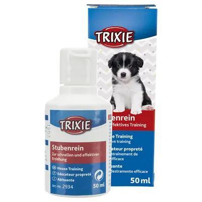 Trixie Stubenrein, flaska 50 ml och förpackning med valpbild. Synlig text: House Training, Educateur propreté, Abituante, Art.-Nr. 2934, Zur schnellen und effektiven Erziehung.