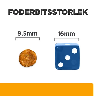 Foderbitsstorlek: rund foderbit 9,5 mm bredvid blå tärning 16 mm som storleksjämförelse. Texten 'FODERBITSSTORLEK' syns överst.