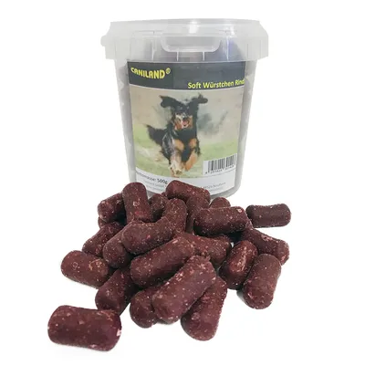 Caniland Soft колбаски с говядиной, ведро 500 г. Лакомство для собак из мягких мясных кусочков, изображение бегущей собаки на упаковке.
