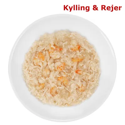 Hvid tallerken med vådfoder, synlige stykker kylling og rejer. Tekst øverst: Kylling & Rejer.