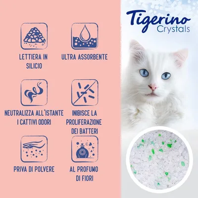 Tigerino Crystals lettiera in silicio ultra assorbente, neutralizza i cattivi odori, inibisce batteri, priva di polvere, al profumo di fiori. Immagine dei cristalli bianchi e verdi.