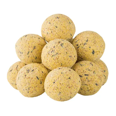 Yellow feed balls with visible grains and seeds, suitable for feeding wild birds.
