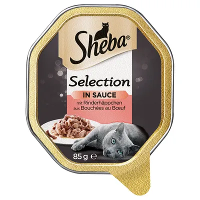 Sheba Selection in Sauce с кусочками говядины, 85 г. На упаковке изображена серая кошка и поданная еда.
