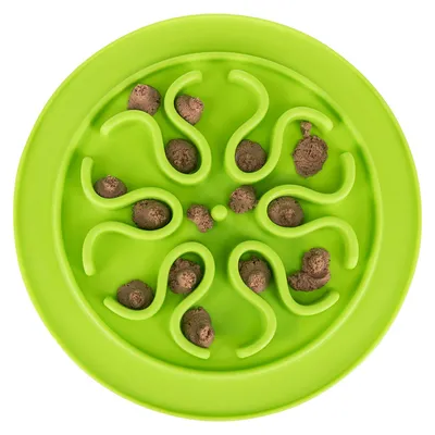 Green anti-gulp bowl with winding indentations, filled with brown food pieces for slow feeding.