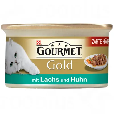 GOURMET Gold mit Lachs und Huhn, lata de comida húmida para gatos. Texto adicional: Zarte Häppchen. Imagem de um prato com pedaços de carne e de um gato branco.