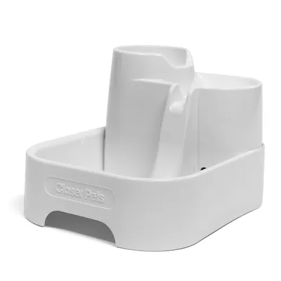 White plastic water fountain with raised spout and basin, designed for pets. Embossed 'Closer Pets' branding visible on the front.