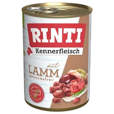 Blik Rinti Kennerfleisch mit Lamm, getreidefrei. Afbeelding van vlees en orgaanvlees op het etiket. Tekst in het Duits zichtbaar.