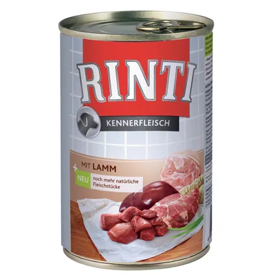 RINTI Kennerfleisch dåse med teksten 'MIT LAMM', 'NEU noch mehr natürliche Fleischstücke' og billede af råt kød på emballagen.