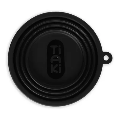 Bol pliabil din silicon negru cu logo Tiaki, potrivit pentru călătorii.