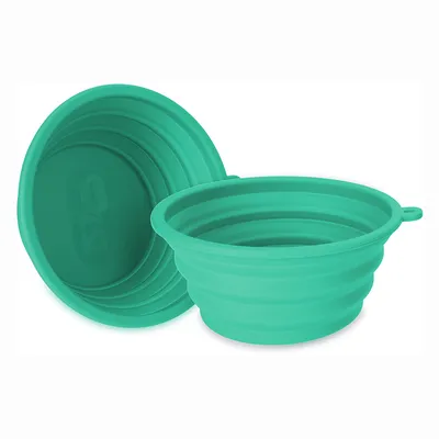Collapsible green silicone bowl with ribbed design and side eyelet. Suitable for travel or on the go.