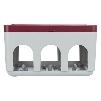 Plastová šedá a vínová krabice s třemi obloukovými otvory vpředu a výstupky uvnitř na dně, bez viditelné značky nebo textu.