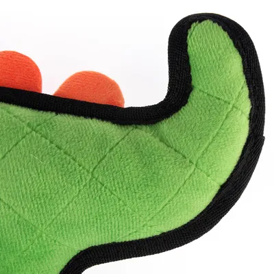 Grønt stoflegetøj med sort kant og orange detaljer, egnet til kæledyr.