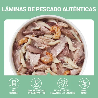 Láminas de pescado auténticas. No gluten, no conservantes artificiales, no sabores ni colores artificiales, non GMO (texto en inglés). Imagen de comida húmeda con trozos de pescado y marisco.