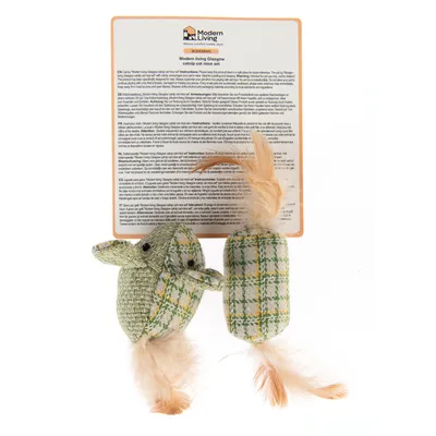 Set de 2 souris en tissu à carreaux verts et jaunes avec plumes, Modern Living Glasgow. Notice multilingue visible derrière, incluant instructions en français.