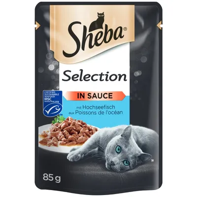 Sheba Selection In Sauce, aux Poissons de l’océan, sachet 85 g, label MSC visible, image d’un chat gris et d’une assiette de morceaux en sauce. Texte partiellement en allemand.