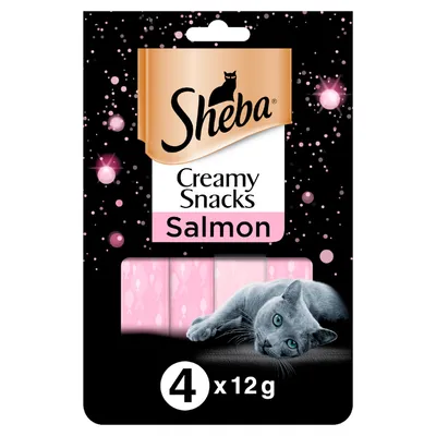 Sheba Creamy Snacks Salmon, 4 x 12g. Black pack with pink accents and a grey cat image. Visible text: Sheba, Creamy Snacks, Salmon, 4 x 12g.