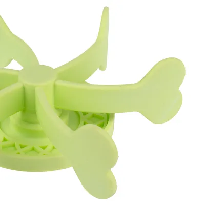 Green plastic toy with bone-shaped arms, suitable for interactive play.