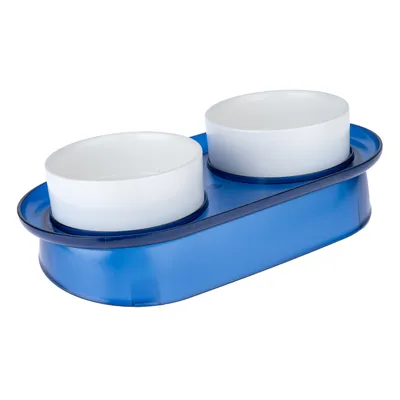Doppelnapf aus weissem Kunststoff mit blauem Halter, geeignet für Futter und Wasser.