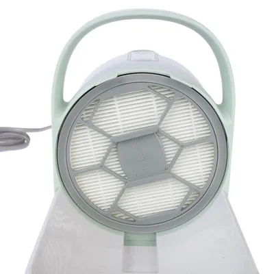 Close-up of a round filter with plastic frame and handle, suitable for air purification or water filtration. The text 'Pull Aside' is visible on the filter.