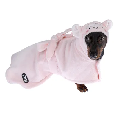 Dog in pink bathrobe with hood and Tiaki logo, showing product use for pet care.