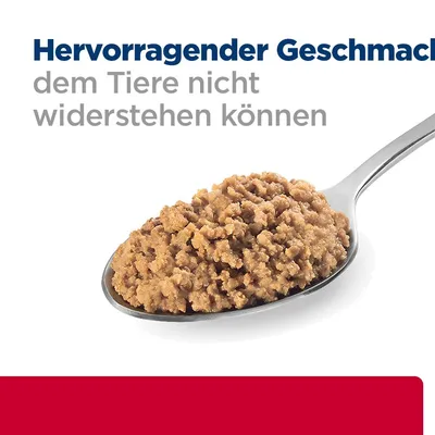 Hervorragender Geschmack, dem Tiere nicht widerstehen können. Abgebildet: Löffel mit braunem Nassfutter.