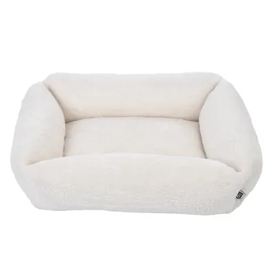 White, rectangular pet bed with soft padding and raised edge. Small brand label visible on the side.