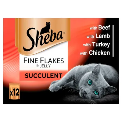 Sheba Fine Flakes in Jelly Succulent, with Beef, Lamb, Turkey, Chicken, pack of 12. Image shows a grey cat lying down and product branding.