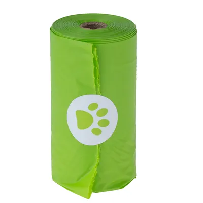 Groene rol met hondenpootsymbool, vermoedelijk afvalzakje of poepzakje voor huisdieren.