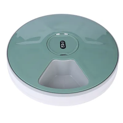 Round, green feeder with Tiki logo and an open compartment for pet food.