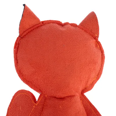 Close-up of a red plush toy with pointed ears and stitched outline, showing the back view and texture of the material.