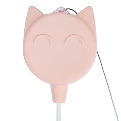 Toy in cat head shape made of pink plastic with integrated smiling face and stick holder.