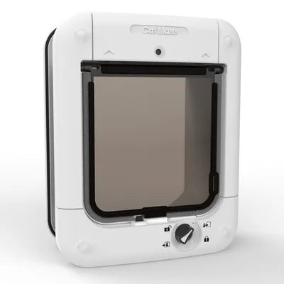 Cat Mate cat flap with white frame, transparent door and rotary knob for 4-way locking.