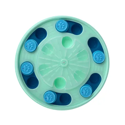 Round, green interactive toy with blue paw-shaped sliding lids, suitable for hide-and-seek feeding.