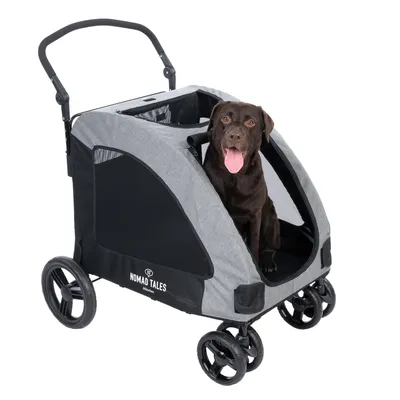 Nomad Tales Haustierwagen in Grau mit schwarzem Netz, Hund sitzt im offenen Wagen.