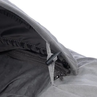 Close-up of a grey fabric cover with zip and drawstring, suitable for adjustment or fastening.