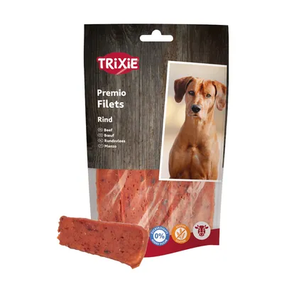 Opakowanie Trixie Premio Filets Rind, widoczny filet wołowy, napisy: Beef, 0% dodatku cukru, bez glutenu, symbole wołowiny i jakości. Zdjęcie psa na opakowaniu.